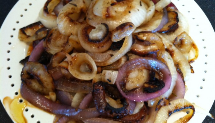 A close up shot of grilled onions rings