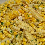 A close up of shaved grilled corn in a bowl